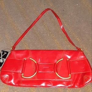 XOXO size small/medium red with gold hardware purse brand new never used